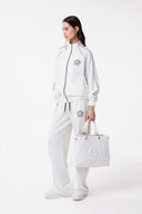 FELPA ALL ZIP IN INTERLOCK CON TAGLIO RAGLAN E AGGIUNTA DI PIPING NERO RICAMO LATO CUORE