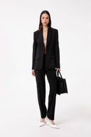 PANTALONE SLIM IN CADY CON MORSETTI ORO SU CINTO