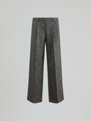 Loose trousers with pleats