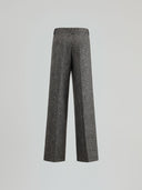 Loose trousers with pleats