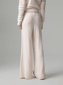 PANTALONE IN MAGLIA CON MOTIVO TRECCIA LATERALE