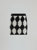 Knitwear skirt with applications