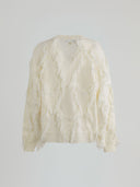 Pullover paricollo a rombi con pendaglio logato sul retro