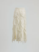 Diamond knitted skirt with logoed pendant on the front