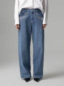 JEANS BOY FIT CON APPLICAZIONI STRASS SUL DAVANTI