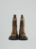 Lace-up boots with tank sole and metal placket