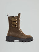 Lace-up boots with tank sole and metal placket