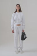 Pantalone jogger in felpa con polsino al fondo