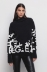 Pullover Collo Alto Fantasia Allover Nero Offwhite