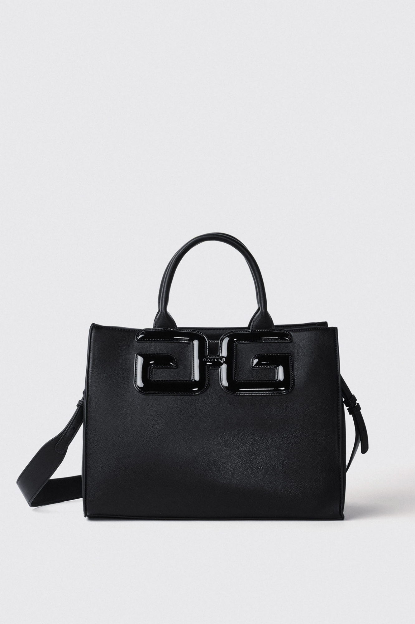 Reg hand bag in vernice con maxi patch double g • Nero